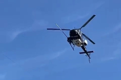 Yüksek gerilim hatları helikopter yardımıyla temizlendi