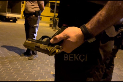 Gece bekçileri ruhsatsız tabancayla gezen şüpheliyi yakaladı