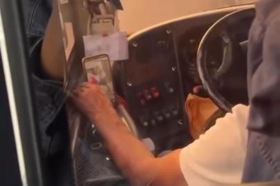 Otobüs şoförü direksiyon başında video izledi