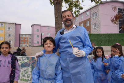 Metrelerce duvarı minikler boyadı