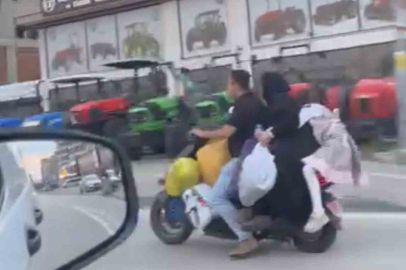 Elektrikli scooter üzerindeki tehlikeli yolculuk kamerada