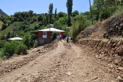 Yolu olmayan yatalak vatandaş için köylü arazisini verdi, belediye yol yaptı