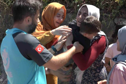 Kaybolan çocuğuna kavuşan anne sevinçten bayıldı