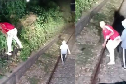 Hareket halindeki trenin önünü kestiler, içeri alınmayınca treni taşladılar