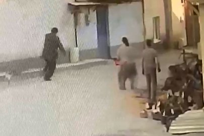 Kadının motorlu testere ile yaşlı adamı korkuttuğu anlar kamerada