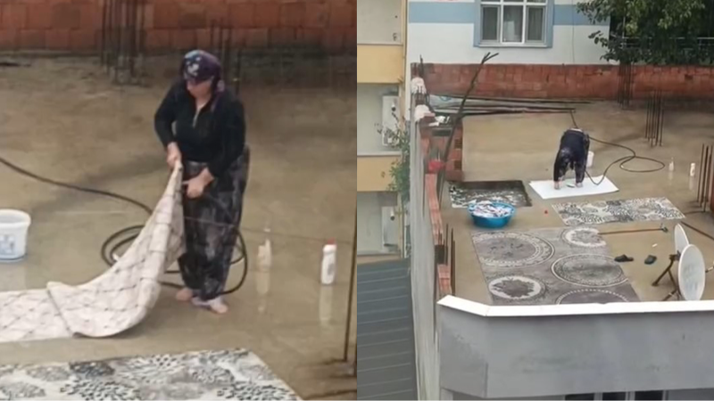 Yağmurlu havada çatıda halı yıkadı